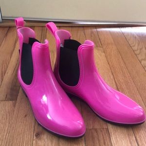Brand new Seven rain boots.